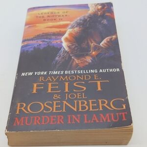 Murder in Lamut by Raymond E. Feist & Joel Rosenberg - Orange/Black Cover